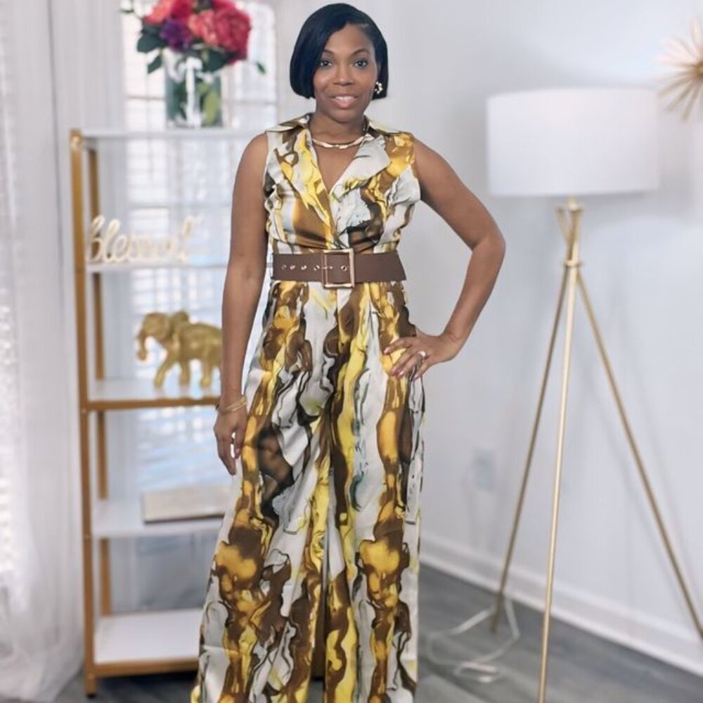SLEEVELESS BELTED JUMPSUIT